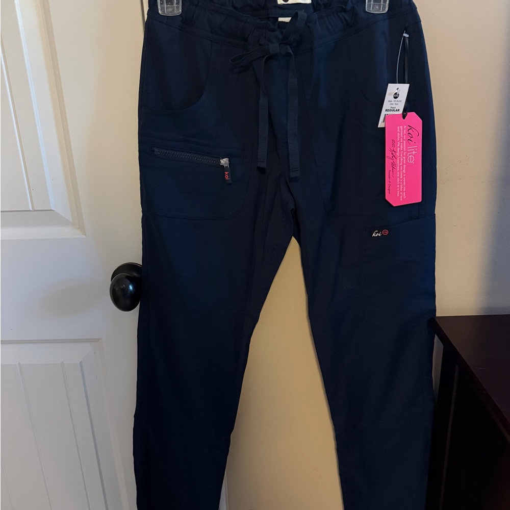 koi Lite Peace Women's 6-Pocket Stretch Scrub Pants Navy. Size XXS Regular. NWT.